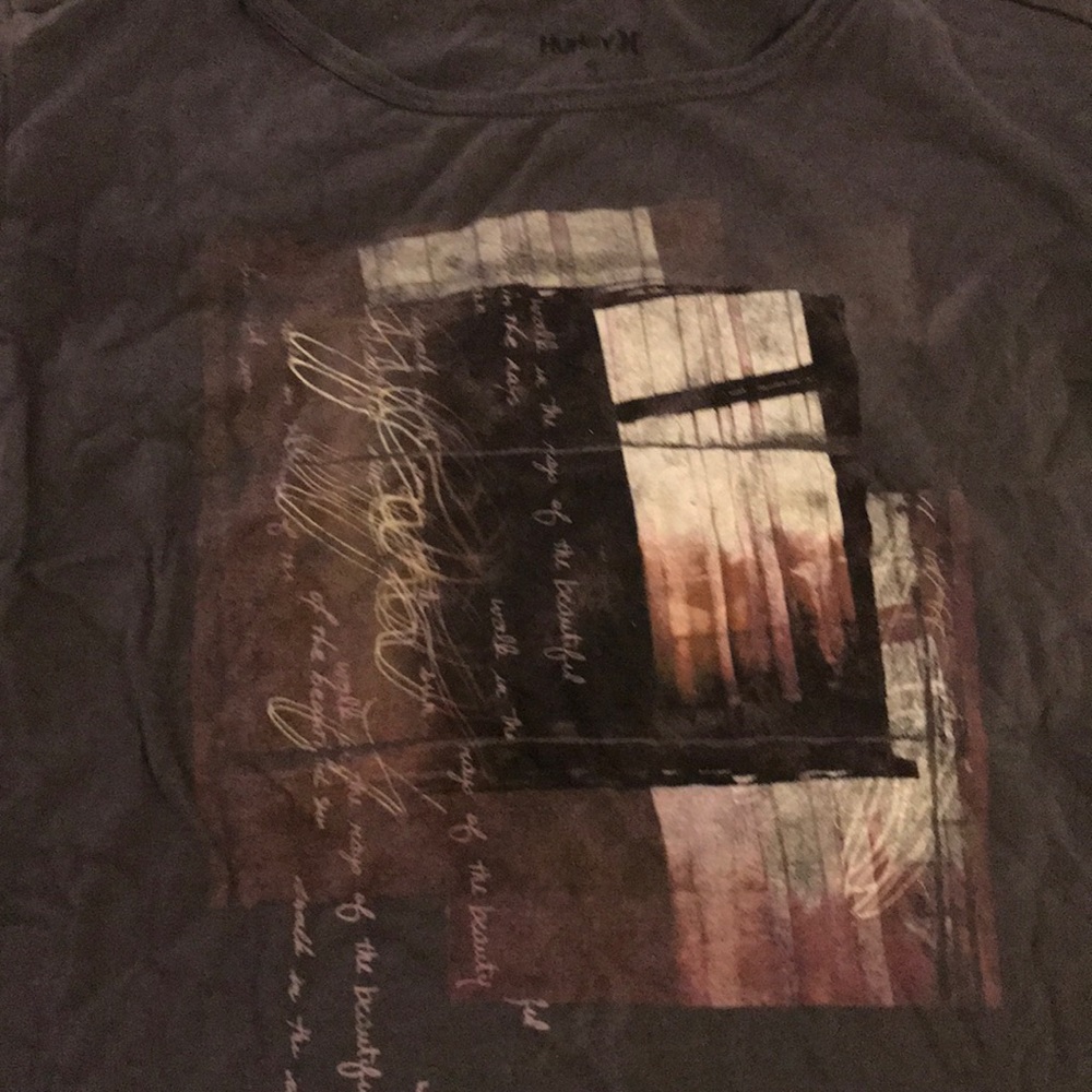 Shirt with picture on front.